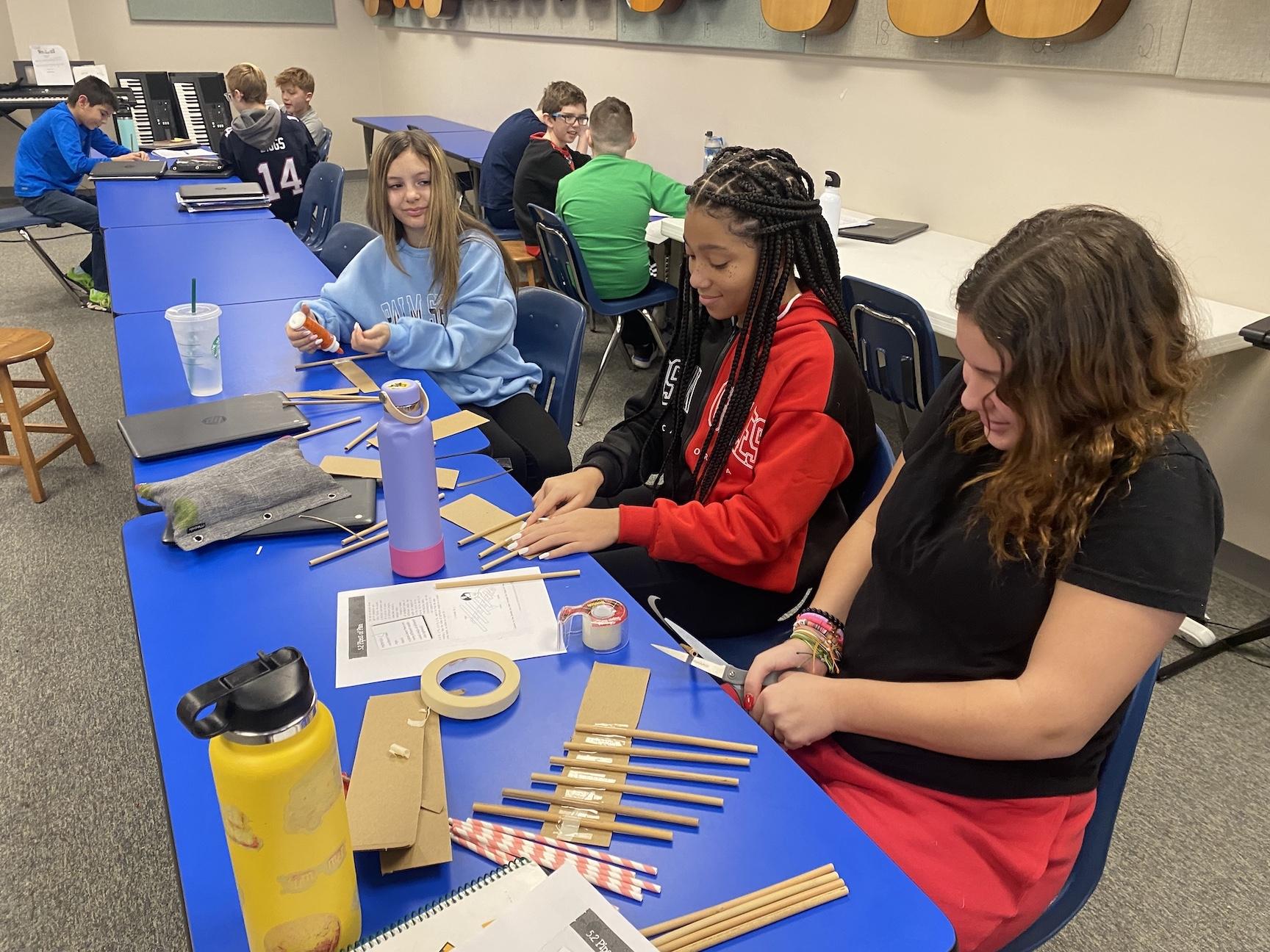 Trafford Middle School sixth-graders assemble their instruments